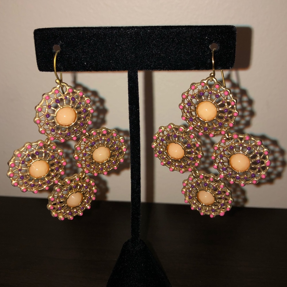 Statement medallion earrings.